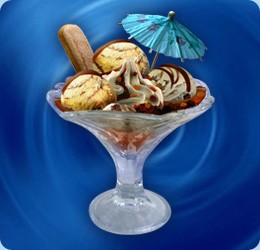 whisky-cream ice cream (2 scoops), rum ice cream with raisins (1 scoop), raisins, topping: caramel, cream, sweet biscuit